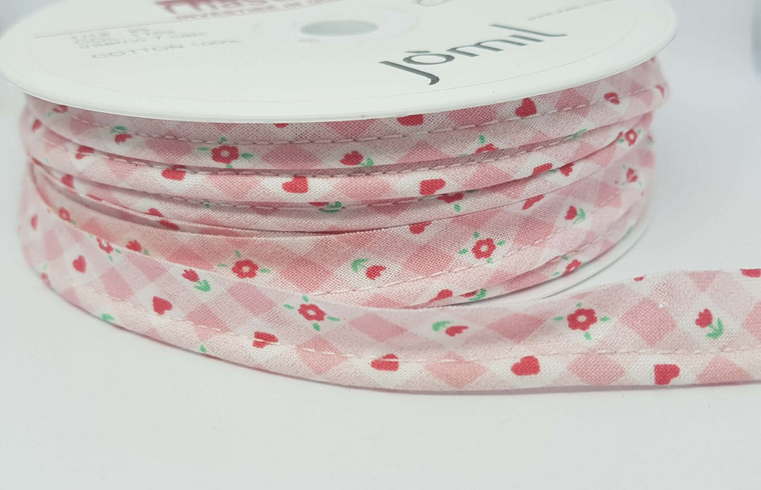 Patterned flanged 10mm wide piping cord trim 2 mm. Floral and polkadot trim. Per Metre