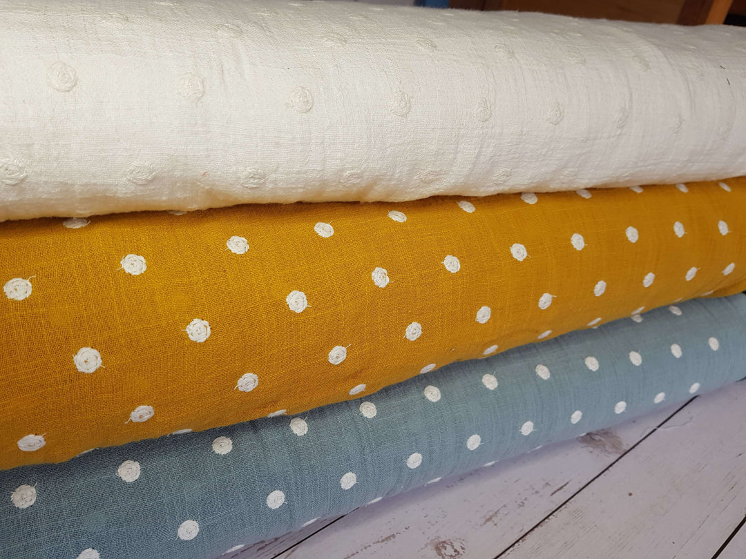 Cotton Dobby Slub Spot fabric by the half metre. White, ochre, sage green.