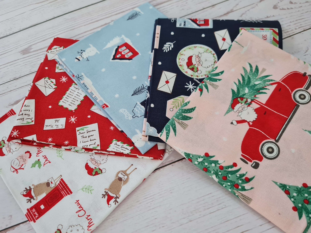 Christmas Post - Christmas fat quarters bundle of 5 quilting cotton Fabrics.