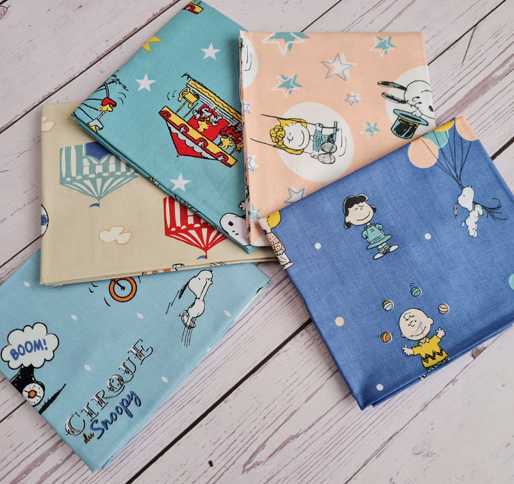 Peanuts and Snoopy Circus bundle of 5 cotton quilting fabrics.