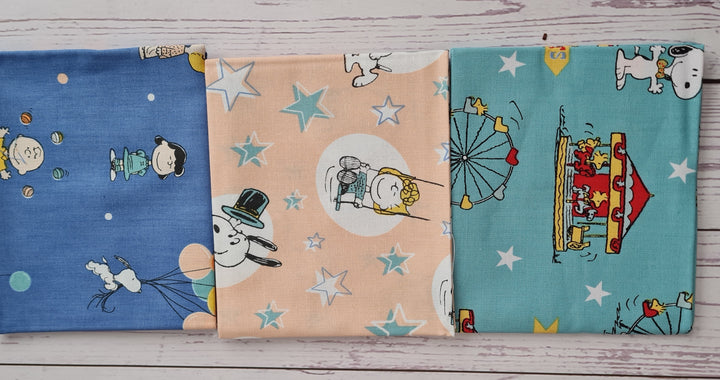 Peanuts and Snoopy Circus bundle of 5 cotton quilting fabrics.