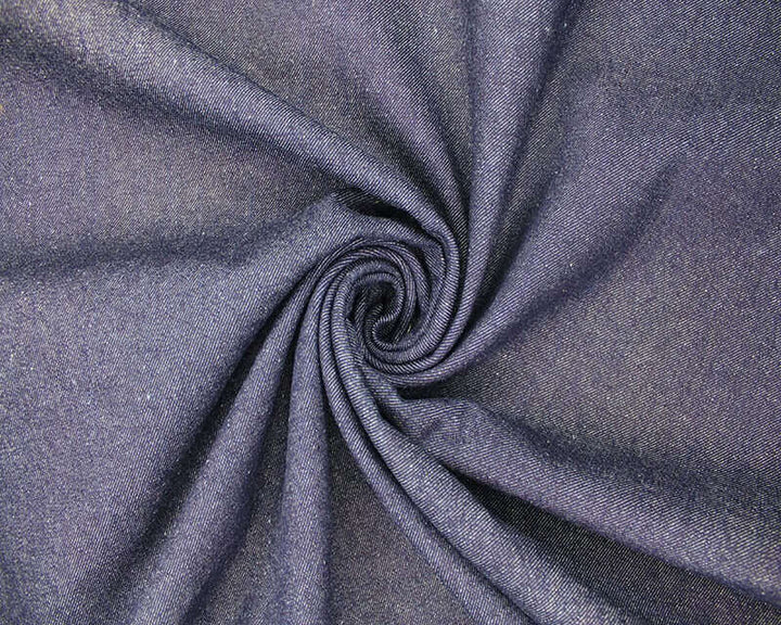 9 oz Stretch Denim: blue cotton 2% spandex. Dressmaking fabric. 86cm roll end