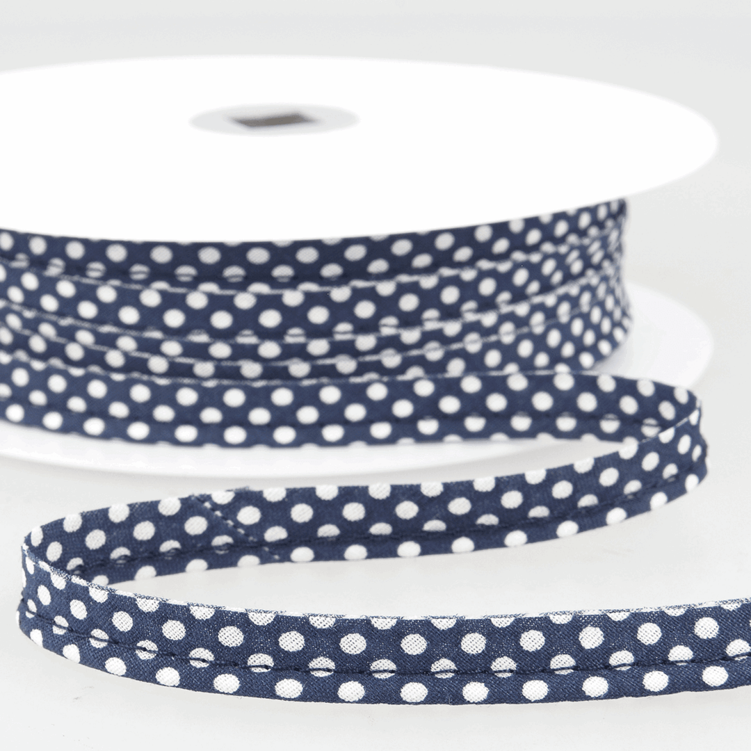 Patterned flanged 10mm wide piping cord trim 2 mm. Floral and polkadot trim. Per Metre